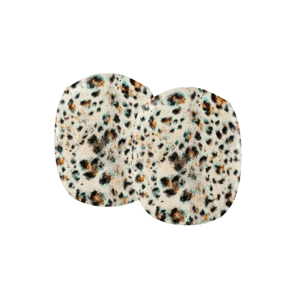 Close up detail of turquoise leopard spots on an AirPods Max earcup cover