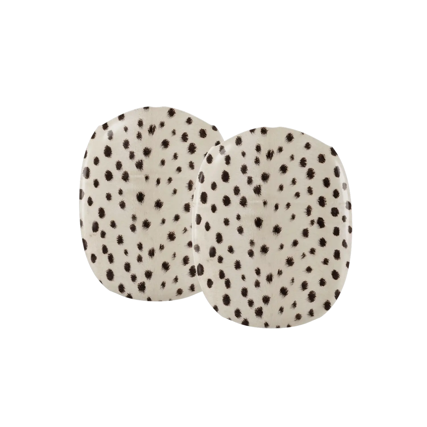 Close up detail of small black cheetah spots on an ivory AirPods Max earcup cover