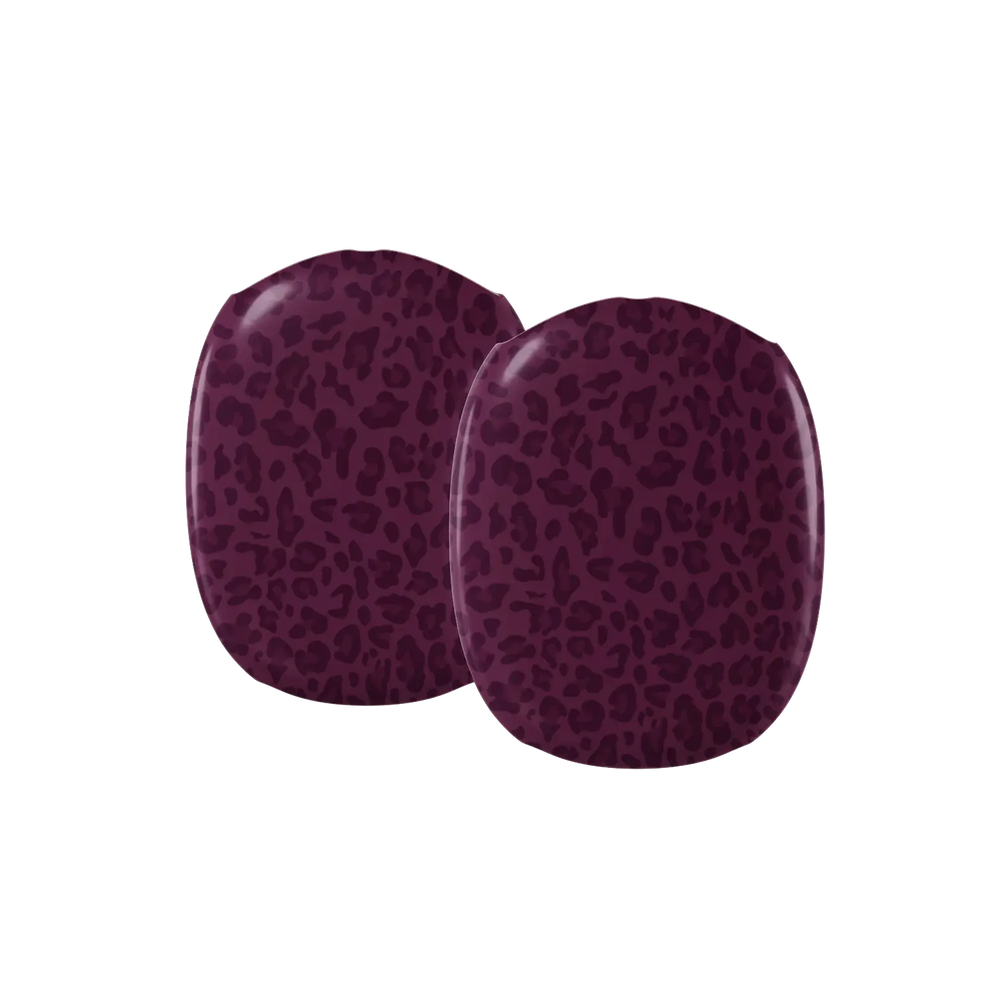 Close up detail of tonal wine and plum leopard rosettes on an AirPods Max earcup cover