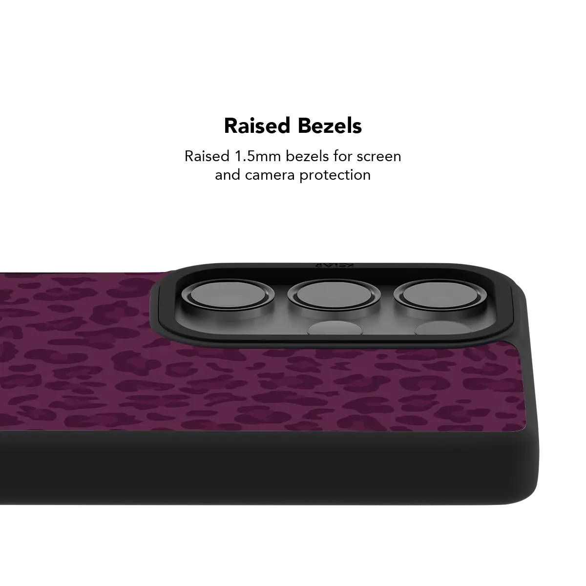 Raised bezel on the burgundy leopard Galaxy case lifting the camera lenses clear of a flat surface