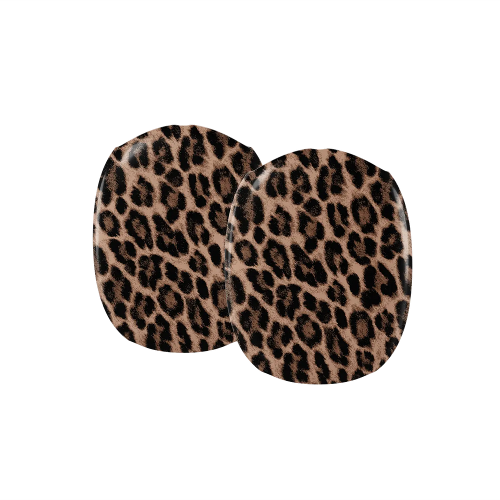 Close up detail of tan and black leopard rosettes on an AirPods Max earcup cover