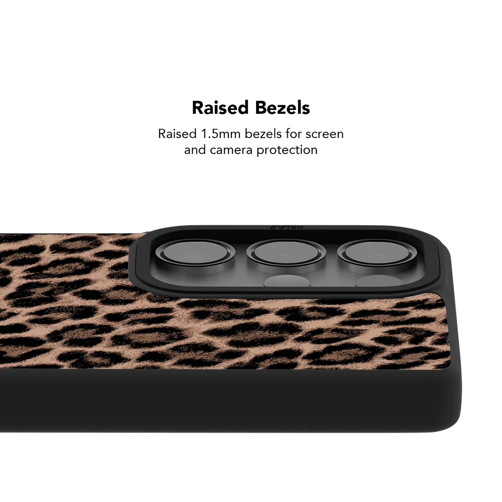 Raised bezel on the brown leopard Galaxy case lifting the camera lenses clear of a flat surface