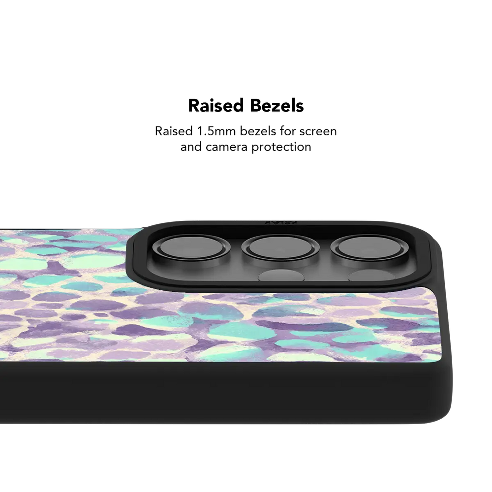 Raised bezel on the Wild Sugar lilac leopard Galaxy case lifting the camera lenses clear of a flat surface.