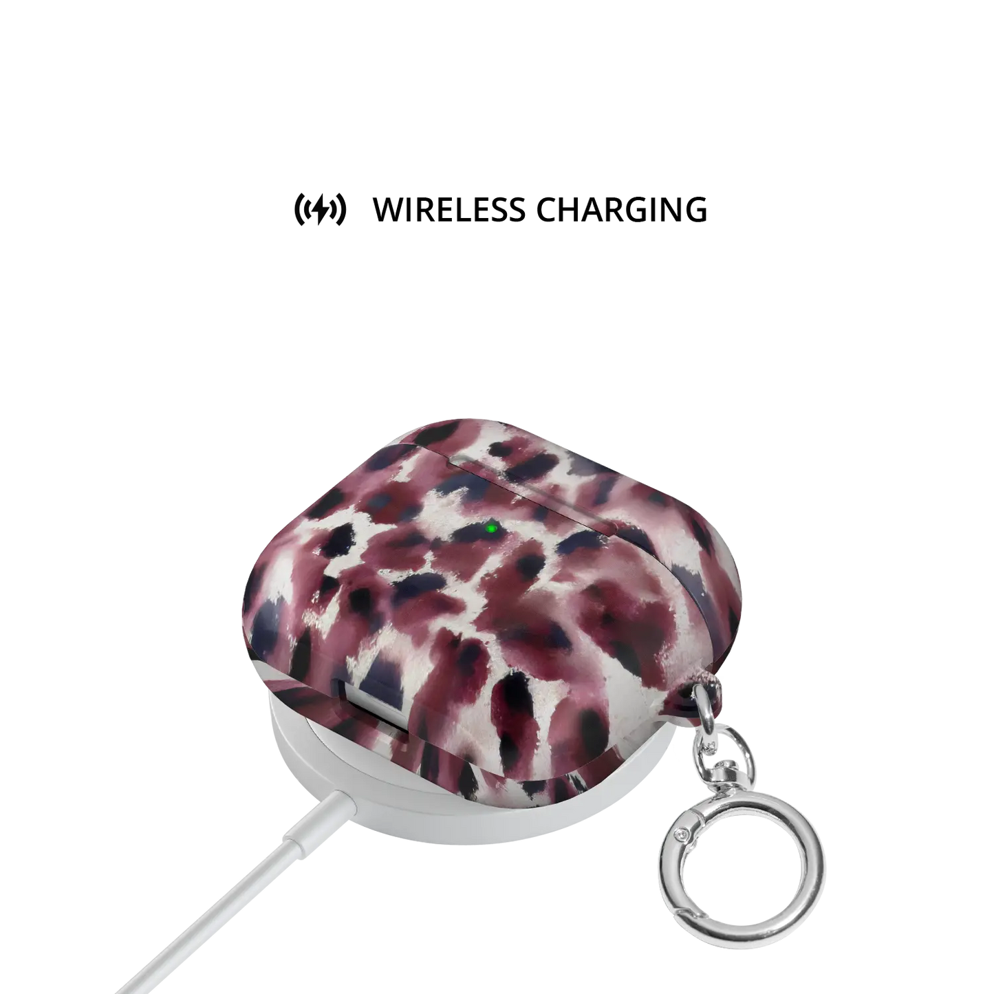 Bitten | Dark Red Cheetah AirPods Case - shown on wireless charger