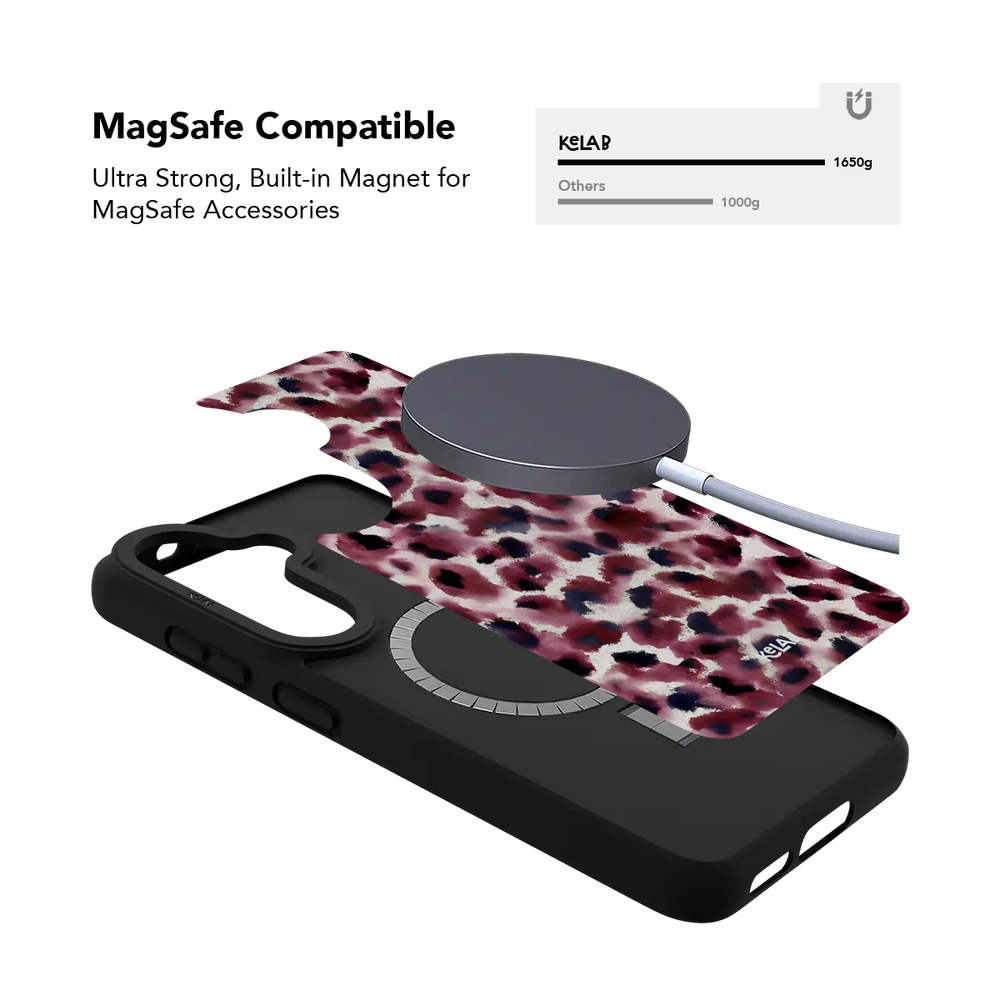 Bitten dark red cheetah print Samsung Galaxy case holding a magnetic wireless charger through the built in ring.