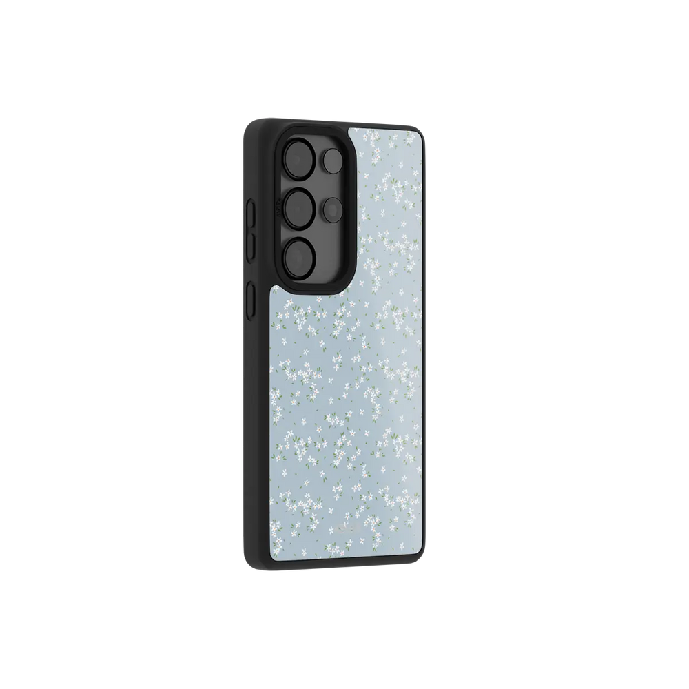 Blue Ditsy Floral Samsung Galaxy case, side angle view with the pattern wrapped around the buttons