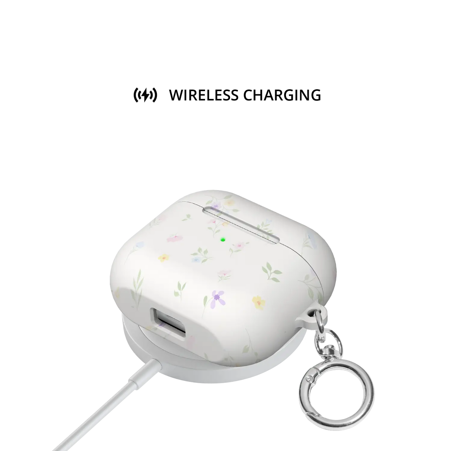 Meadow Spell | Pastel Watercolor Ditsy Floral AirPods Case - shown on wireless charger