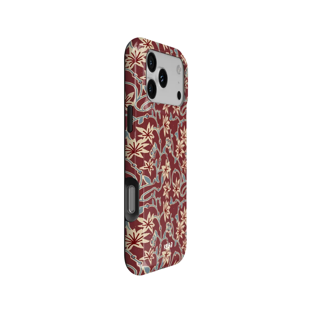 burgundy vine floral print iPhone case in Tough finish – side angle view showing button cutouts and wraparound edge