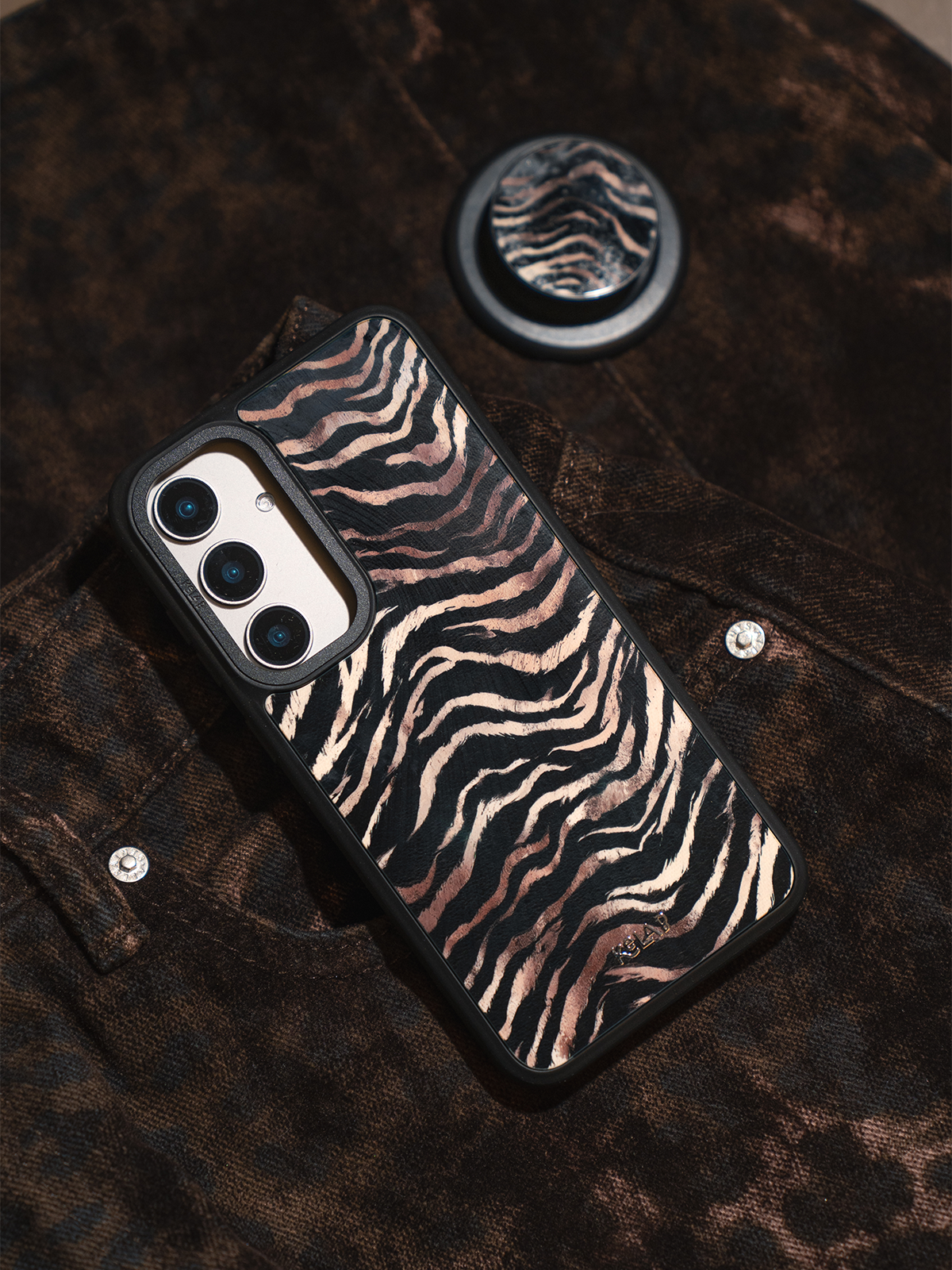 Zebra Stripe Samsung Phone case, lifestyle shot with matching zebra stripe MagSafe grip accessory