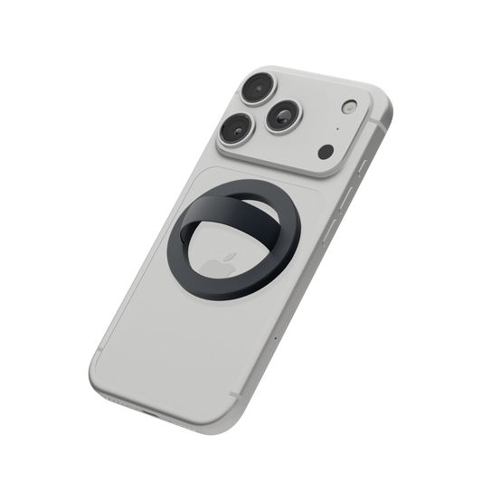 Charcoal gray MagSafe loop grip attached to the back of an iPhone