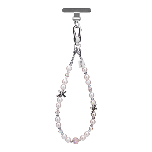 Elegant pearl phone charm with silver accents and crystal embellishments, perfect for special occasions.