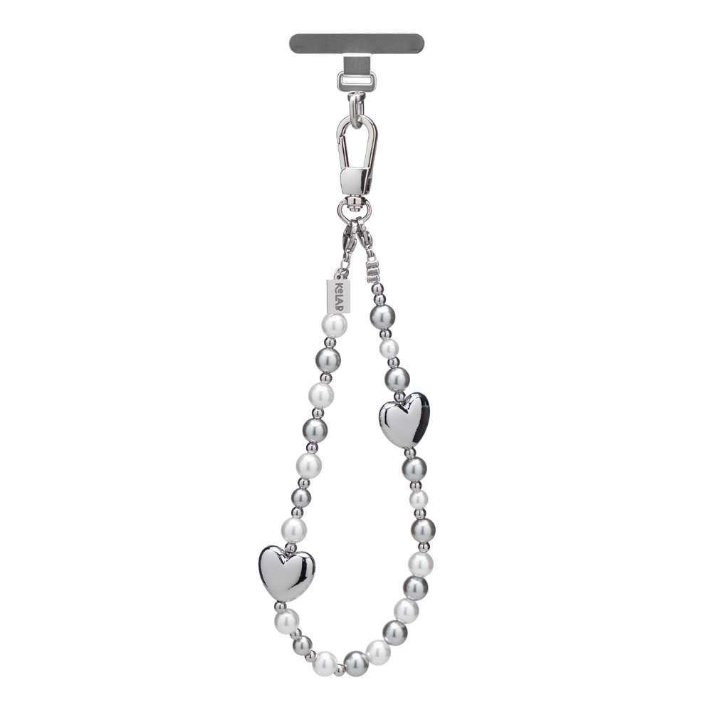 Silver heart charm lanyard with beads, perfect for holding phone and keys.