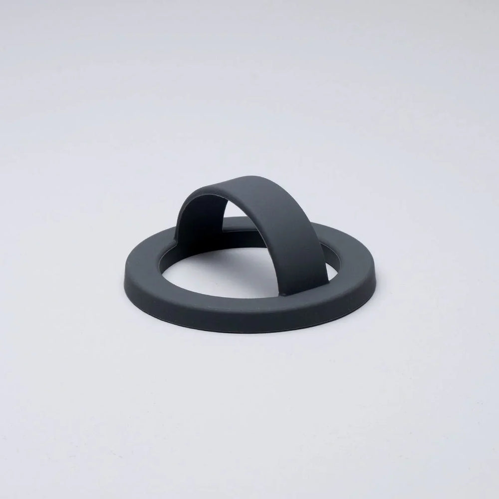 Graphite charcoal gray silicone MagSafe loop grip with magnetic ring and finger loop