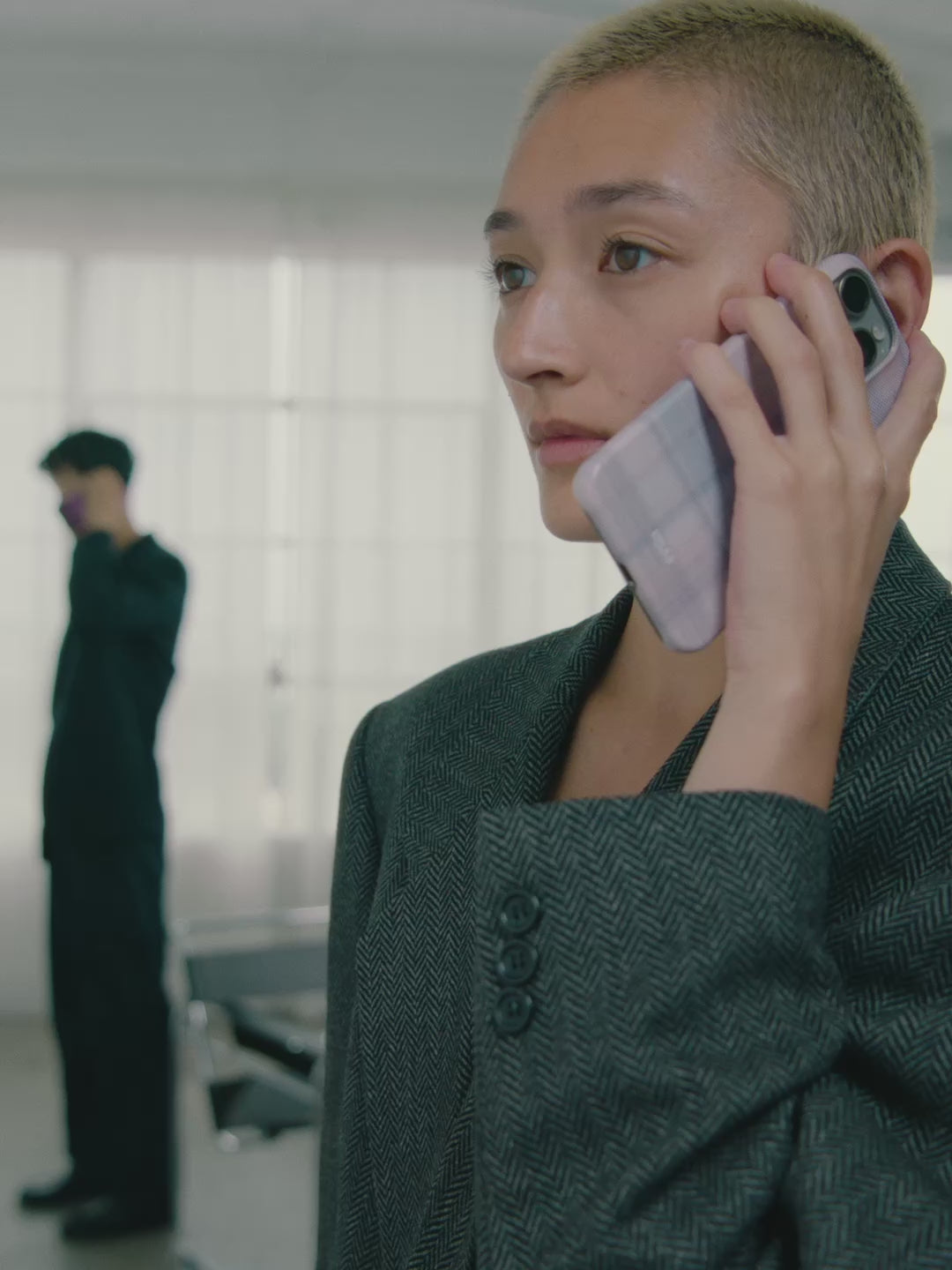 Brand Campaign video for mobile site features two model holding KELAB phone case with minimalist visual style