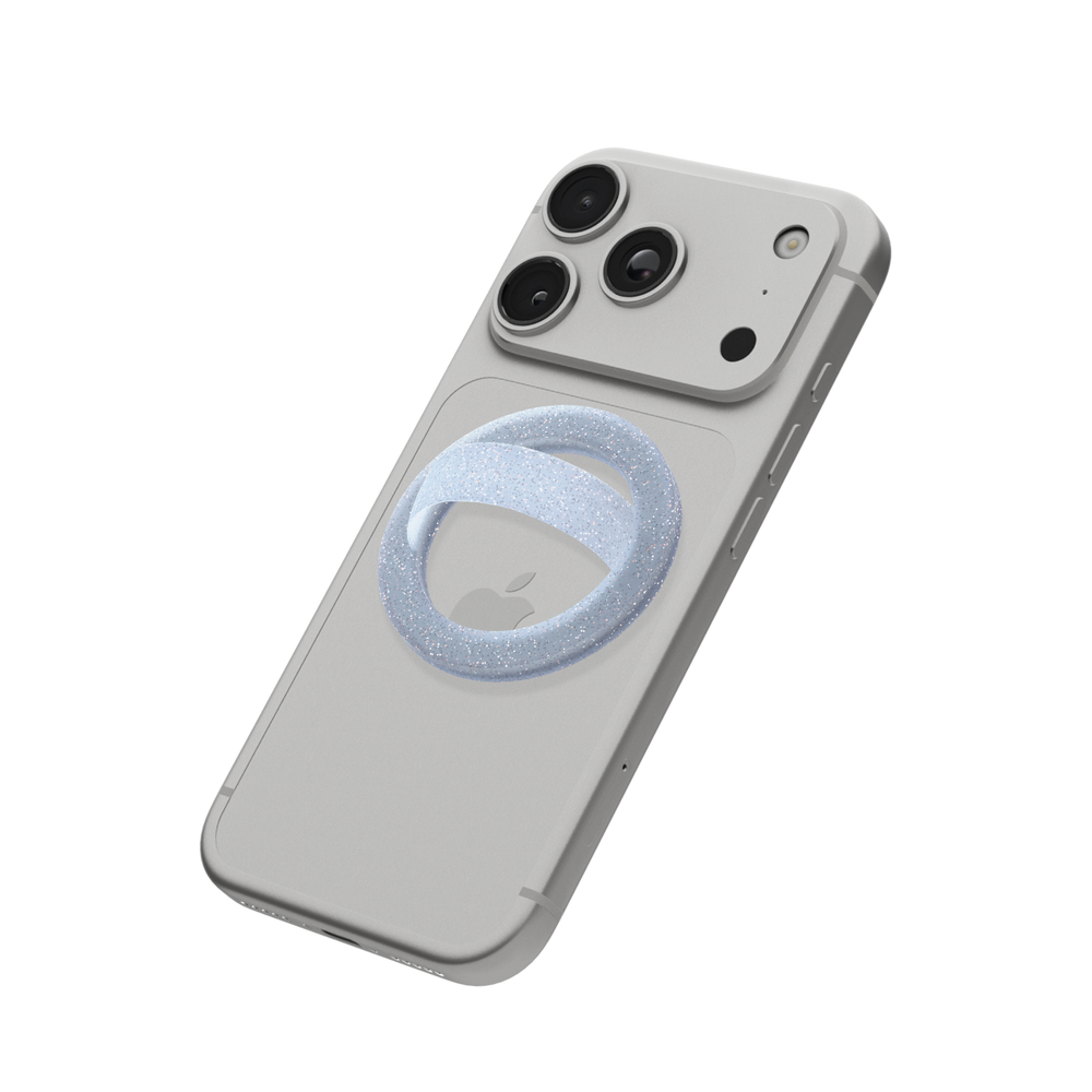 Icy blue glitter MagSafe loop grip attached to the back of an iPhone