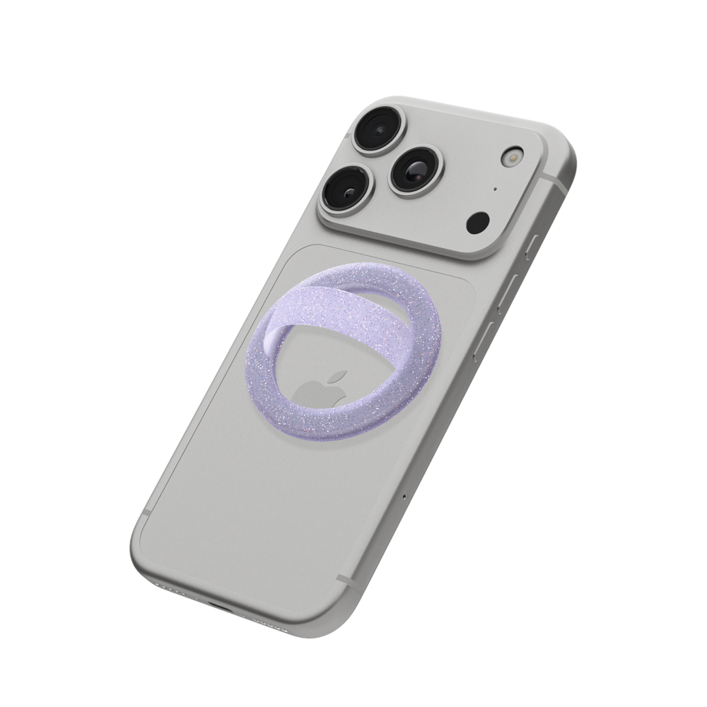 Lavender glitter MagSafe loop grip attached to the back of an iPhone