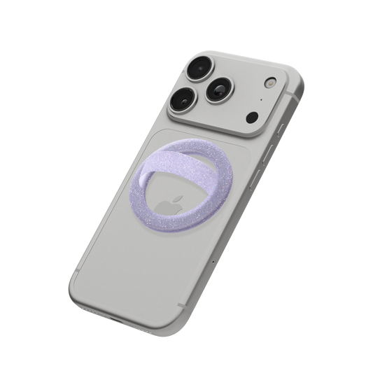 Lavender glitter MagSafe loop grip attached to the back of an iPhone